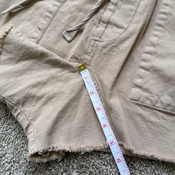 The Great. The Midland Frayed Paperbag Drawstring High Waist Shorts in Sand/Tan - Picture 11 of 12